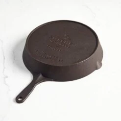 Smithey Ironware No. 12 Traditional Cast Iron Skillet -BBQ Depot 12T Angle Back 720x 65e11482 db66 4a85 90f6 2fdec679ab5e